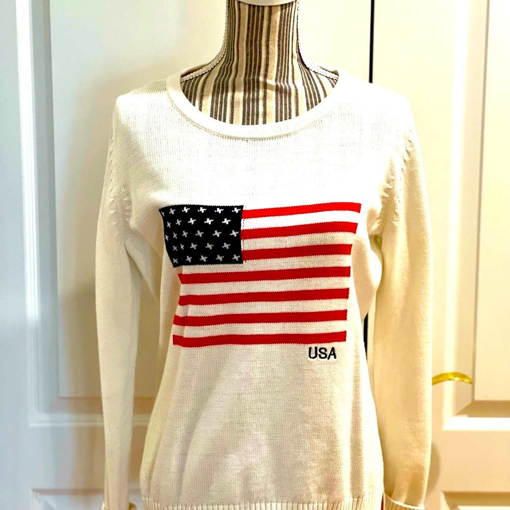 This beautiful sweater is new but doesn’t have tags.  Never worn. With flag